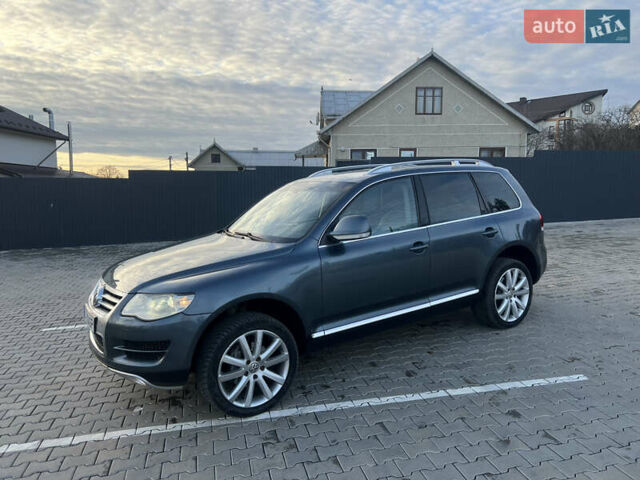 Серый Фольксваген Туарег, объемом двигателя 3 л и пробегом 260 тыс. км за 6599 $, фото 6 на Automoto.ua