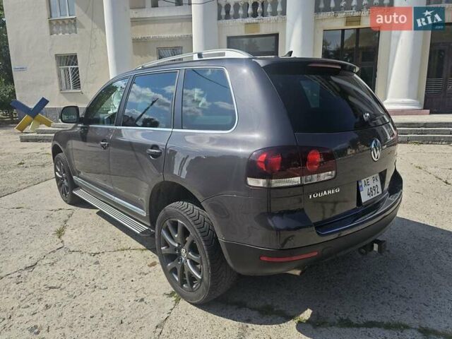 Серый Фольксваген Туарег, объемом двигателя 3 л и пробегом 187 тыс. км за 15500 $, фото 1 на Automoto.ua