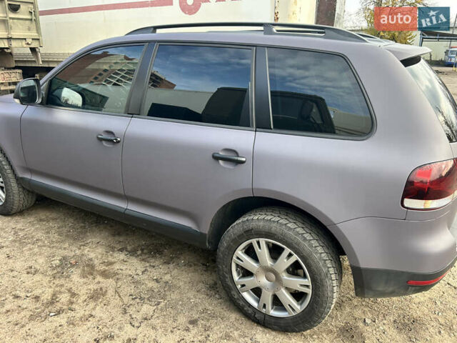 Серый Фольксваген Туарег, объемом двигателя 3 л и пробегом 296 тыс. км за 13550 $, фото 5 на Automoto.ua