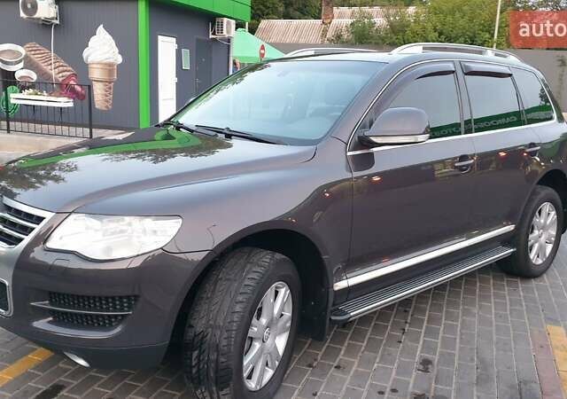 Серый Фольксваген Туарег, объемом двигателя 3 л и пробегом 225 тыс. км за 16900 $, фото 16 на Automoto.ua