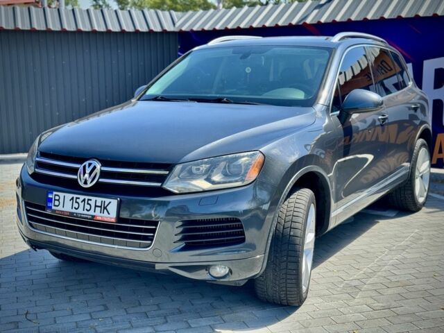 Серый Фольксваген Туарег, объемом двигателя 3 л и пробегом 460 тыс. км за 14300 $, фото 2 на Automoto.ua