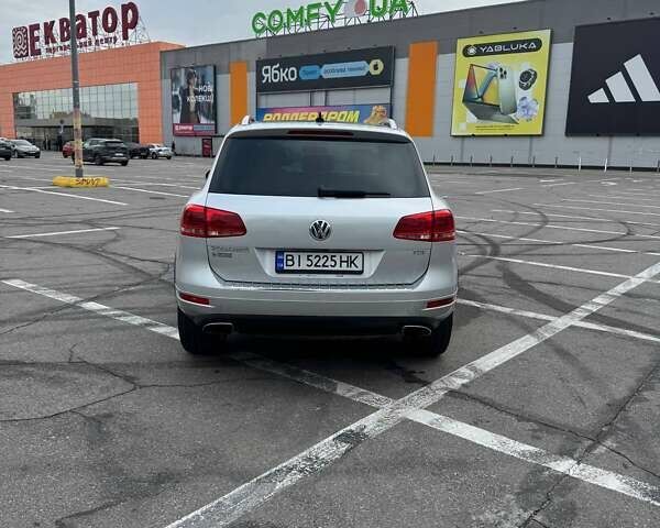 Сірий Фольксваген Туарег, об'ємом двигуна 2.97 л та пробігом 318 тис. км за 19400 $, фото 6 на Automoto.ua