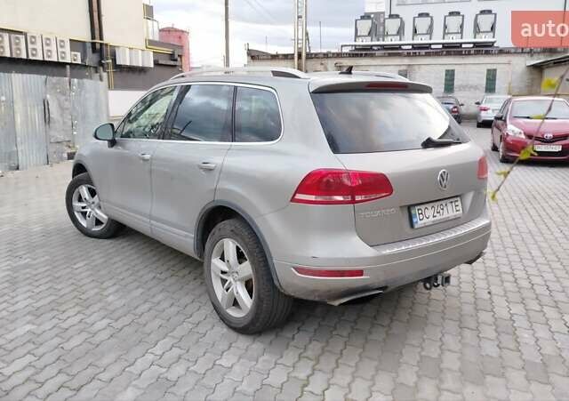 Серый Фольксваген Туарег, объемом двигателя 3 л и пробегом 259 тыс. км за 17000 $, фото 4 на Automoto.ua