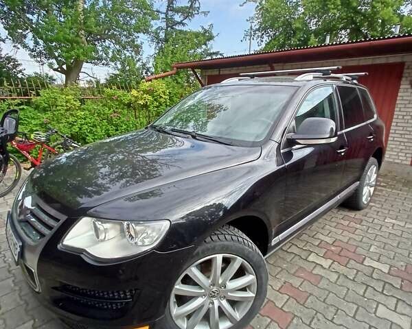 Серый Фольксваген Туарег, объемом двигателя 2.97 л и пробегом 301 тыс. км за 13500 $, фото 8 на Automoto.ua