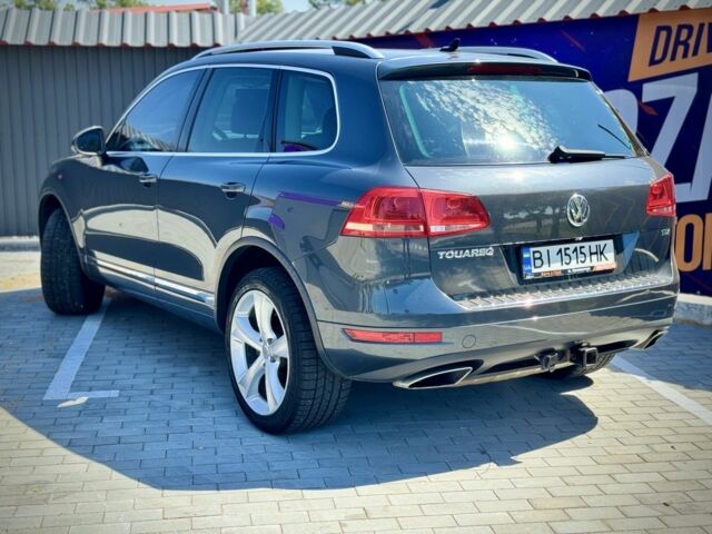 Серый Фольксваген Туарег, объемом двигателя 3 л и пробегом 460 тыс. км за 14300 $, фото 3 на Automoto.ua