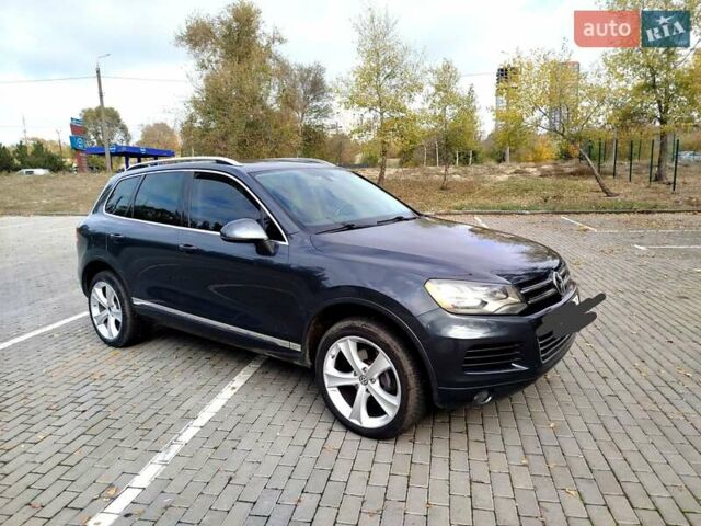 Сірий Фольксваген Туарег, об'ємом двигуна 3 л та пробігом 250 тис. км за 14500 $, фото 4 на Automoto.ua