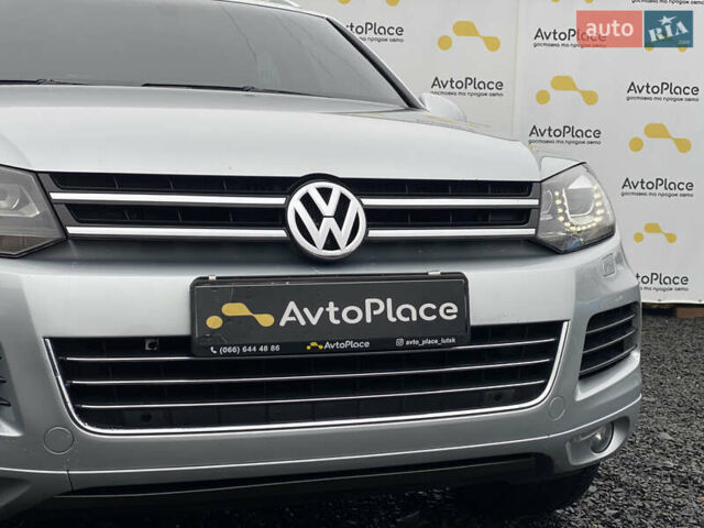 Серый Фольксваген Туарег, объемом двигателя 2.97 л и пробегом 311 тыс. км за 17300 $, фото 3 на Automoto.ua