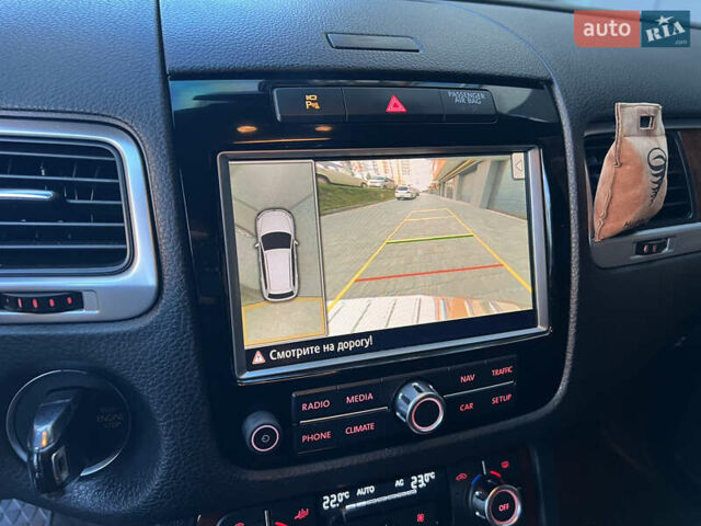 Серый Фольксваген Туарег, объемом двигателя 3 л и пробегом 317 тыс. км за 16499 $, фото 33 на Automoto.ua