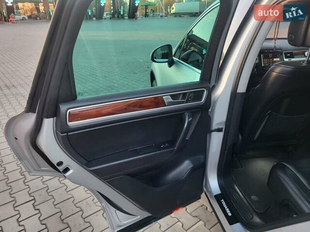 Серый Фольксваген Туарег, объемом двигателя 3 л и пробегом 310 тыс. км за 18500 $, фото 25 на Automoto.ua