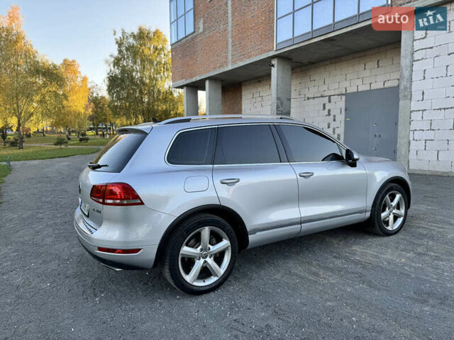 Фольксваген Туарег 2010 в Хмельницком на Automoto.ua Серый Фольксваген Туарег, объемом двигателя 2.97 л и пробегом 317 тыс. км за 15500 $, фото 14 на Automoto.ua