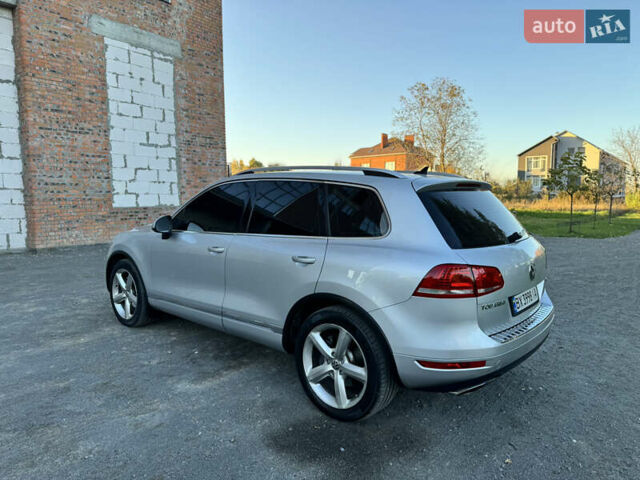 Фольксваген Туарег 2010 в Хмельницком на Automoto.ua Серый Фольксваген Туарег, объемом двигателя 2.97 л и пробегом 317 тыс. км за 15500 $, фото 13 на Automoto.ua