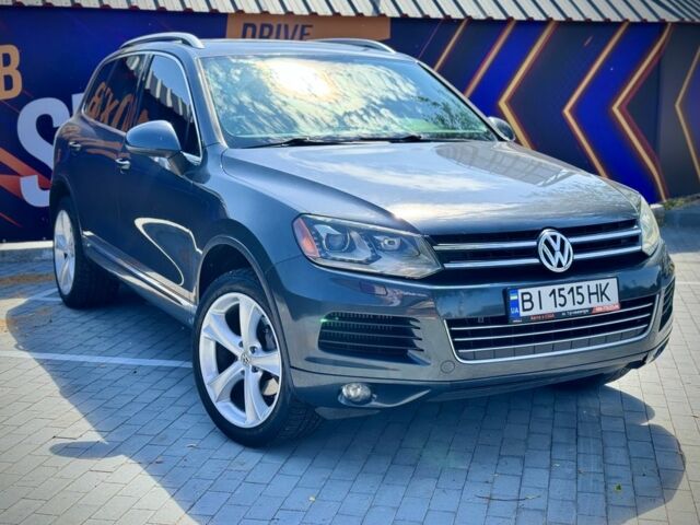 Серый Фольксваген Туарег, объемом двигателя 3 л и пробегом 460 тыс. км за 14300 $, фото 1 на Automoto.ua