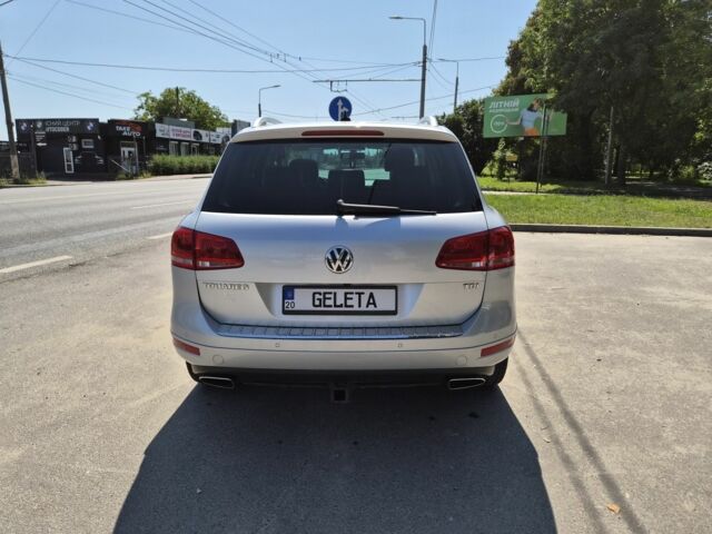 Серый Фольксваген Туарег, объемом двигателя 3 л и пробегом 215 тыс. км за 18000 $, фото 2 на Automoto.ua