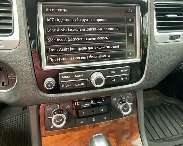 Серый Фольксваген Туарег, объемом двигателя 3 л и пробегом 232 тыс. км за 19700 $, фото 14 на Automoto.ua