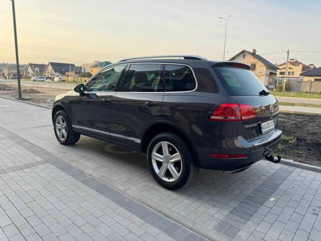 Серый Фольксваген Туарег, объемом двигателя 3 л и пробегом 189 тыс. км за 21500 $, фото 4 на Automoto.ua