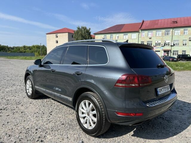 Серый Фольксваген Туарег, объемом двигателя 3 л и пробегом 253 тыс. км за 17000 $, фото 2 на Automoto.ua