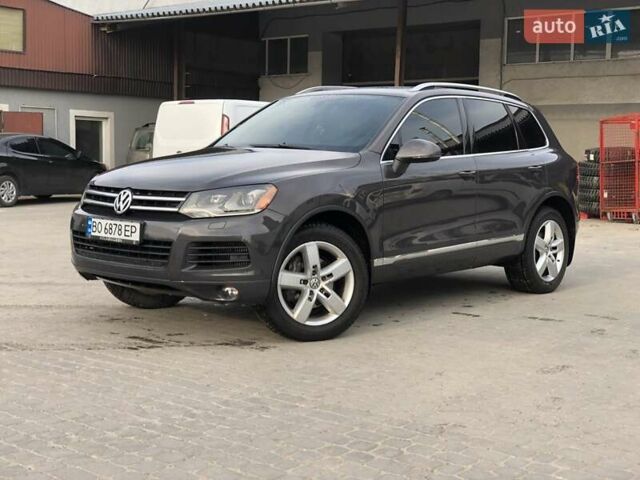 Серый Фольксваген Туарег, объемом двигателя 2.97 л и пробегом 263 тыс. км за 15900 $, фото 1 на Automoto.ua