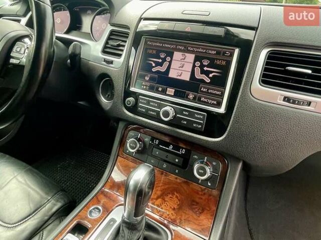 Серый Фольксваген Туарег, объемом двигателя 3 л и пробегом 232 тыс. км за 19700 $, фото 23 на Automoto.ua