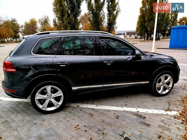 Серый Фольксваген Туарег, объемом двигателя 3 л и пробегом 255 тыс. км за 13500 $, фото 5 на Automoto.ua