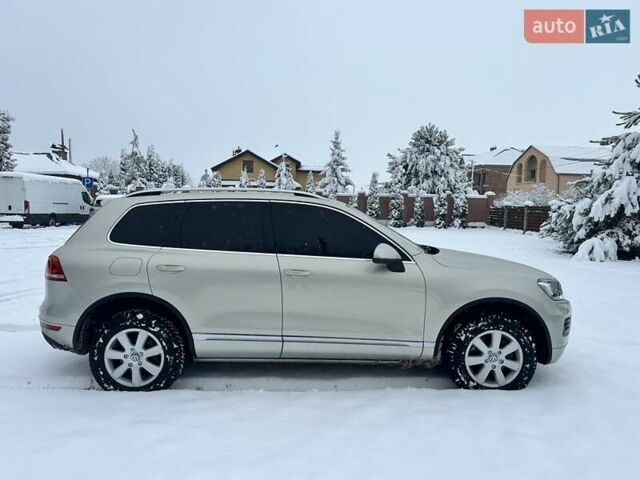 Серый Фольксваген Туарег, объемом двигателя 3 л и пробегом 190 тыс. км за 22700 $, фото 3 на Automoto.ua