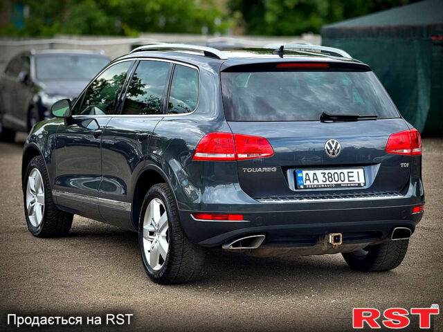 Серый Фольксваген Туарег, объемом двигателя 3 л и пробегом 308 тыс. км за 18500 $, фото 4 на Automoto.ua