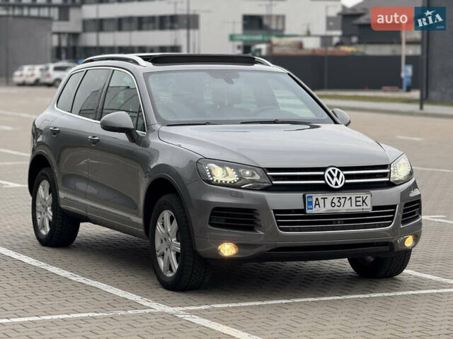 Сірий Фольксваген Туарег, об'ємом двигуна 3 л та пробігом 260 тис. км за 18700 $, фото 1 на Automoto.ua