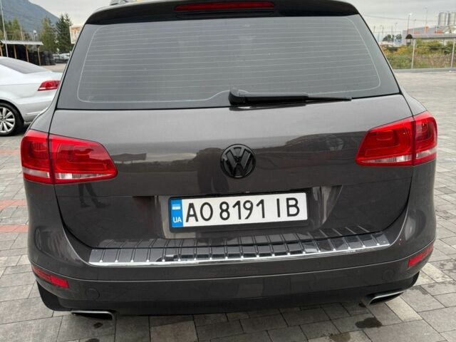 Серый Фольксваген Туарег, объемом двигателя 3 л и пробегом 277 тыс. км за 18300 $, фото 1 на Automoto.ua