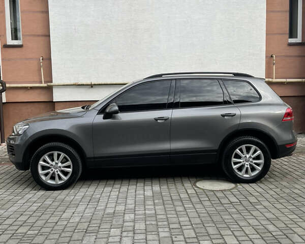 Сірий Фольксваген Туарег, об'ємом двигуна 3 л та пробігом 207 тис. км за 21500 $, фото 14 на Automoto.ua