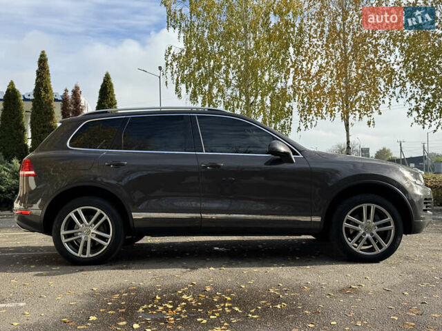 Сірий Фольксваген Туарег, об'ємом двигуна 3 л та пробігом 260 тис. км за 16700 $, фото 6 на Automoto.ua