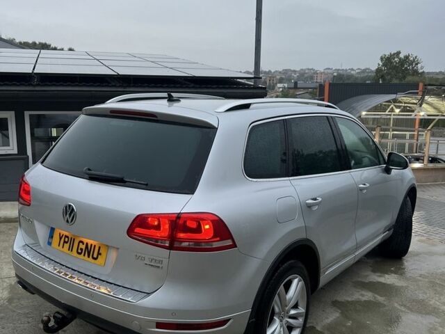 Серый Фольксваген Туарег, объемом двигателя 3 л и пробегом 220 тыс. км за 10750 $, фото 1 на Automoto.ua