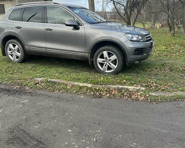 Серый Фольксваген Туарег, объемом двигателя 2.97 л и пробегом 228 тыс. км за 18700 $, фото 6 на Automoto.ua