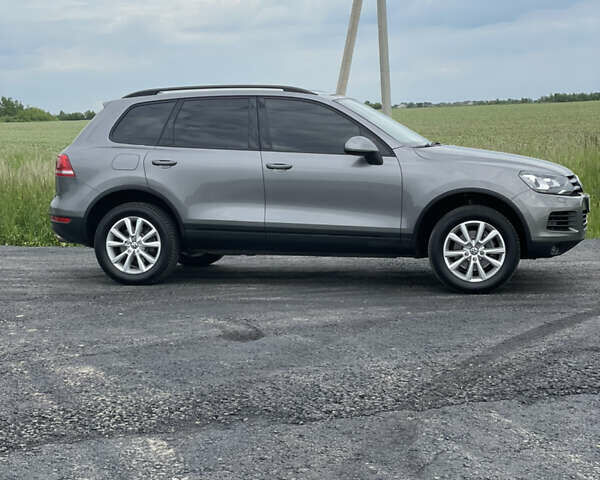 Сірий Фольксваген Туарег, об'ємом двигуна 3 л та пробігом 207 тис. км за 21500 $, фото 6 на Automoto.ua