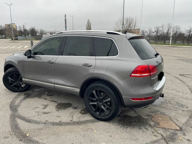 Серый Фольксваген Туарег, объемом двигателя 3.6 л и пробегом 249 тыс. км за 12700 $, фото 7 на Automoto.ua