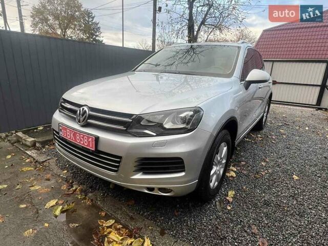 Серый Фольксваген Туарег, объемом двигателя 3 л и пробегом 232 тыс. км за 19700 $, фото 3 на Automoto.ua
