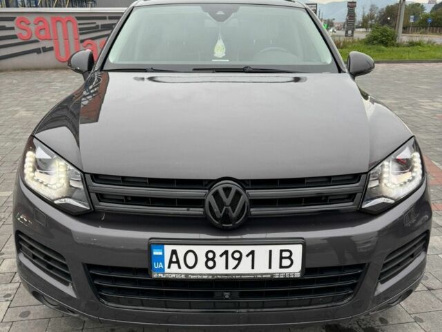 Серый Фольксваген Туарег, объемом двигателя 3 л и пробегом 277 тыс. км за 18300 $, фото 2 на Automoto.ua