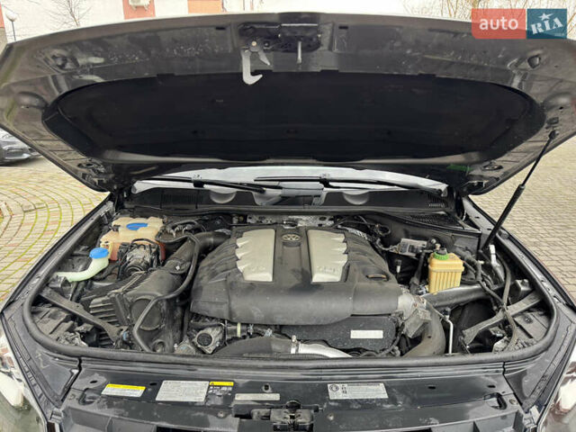 Серый Фольксваген Туарег, объемом двигателя 2.97 л и пробегом 285 тыс. км за 16990 $, фото 47 на Automoto.ua