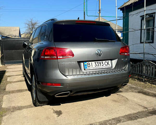 Серый Фольксваген Туарег, объемом двигателя 2.97 л и пробегом 270 тыс. км за 20000 $, фото 1 на Automoto.ua