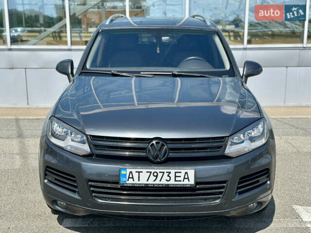 Серый Фольксваген Туарег, объемом двигателя 3 л и пробегом 226 тыс. км за 15490 $, фото 66 на Automoto.ua