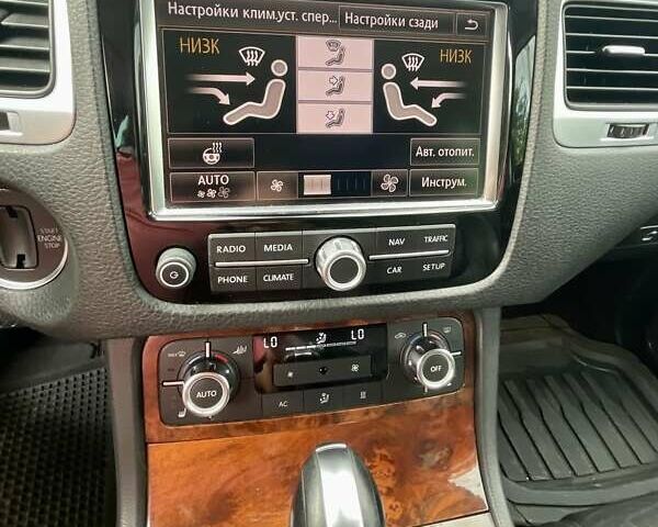 Серый Фольксваген Туарег, объемом двигателя 3 л и пробегом 232 тыс. км за 19700 $, фото 13 на Automoto.ua