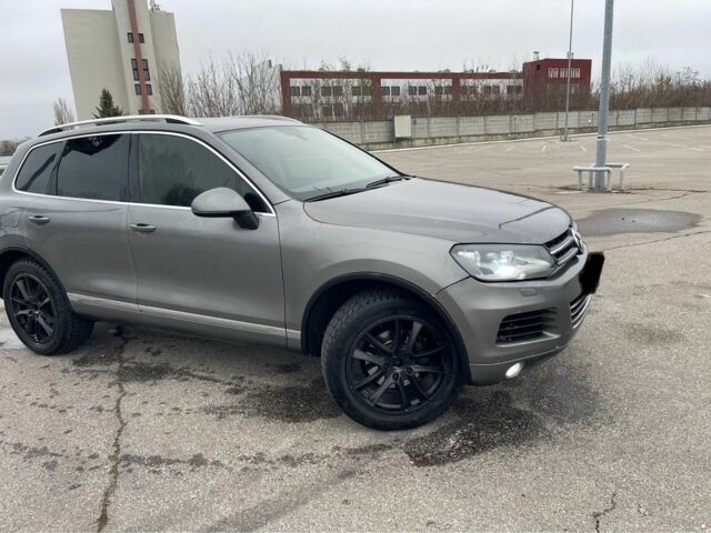 Серый Фольксваген Туарег, объемом двигателя 3.6 л и пробегом 249 тыс. км за 12700 $, фото 2 на Automoto.ua