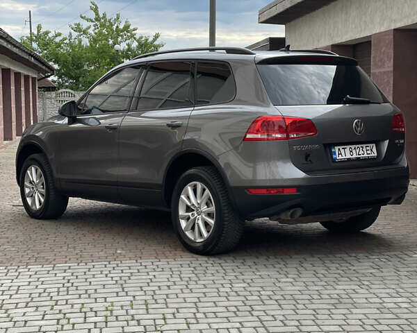 Сірий Фольксваген Туарег, об'ємом двигуна 3 л та пробігом 207 тис. км за 21500 $, фото 13 на Automoto.ua
