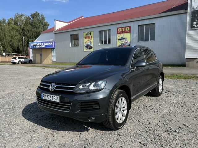 Серый Фольксваген Туарег, объемом двигателя 3 л и пробегом 253 тыс. км за 17000 $, фото 1 на Automoto.ua