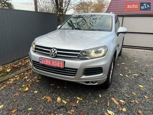 Серый Фольксваген Туарег, объемом двигателя 3 л и пробегом 232 тыс. км за 19700 $, фото 2 на Automoto.ua