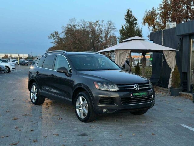 Серый Фольксваген Туарег, объемом двигателя 3 л и пробегом 296 тыс. км за 14490 $, фото 1 на Automoto.ua