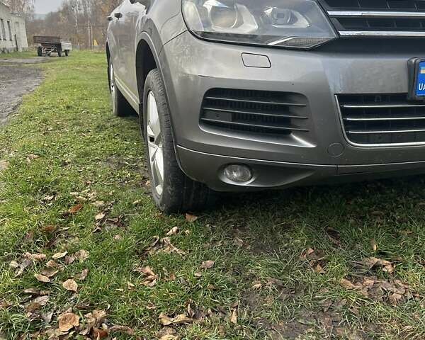 Серый Фольксваген Туарег, объемом двигателя 2.97 л и пробегом 228 тыс. км за 18700 $, фото 1 на Automoto.ua