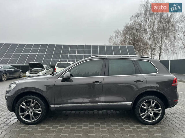 Сірий Фольксваген Туарег, об'ємом двигуна 3 л та пробігом 298 тис. км за 18500 $, фото 39 на Automoto.ua