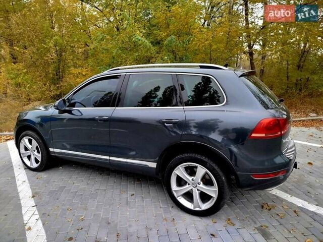 Серый Фольксваген Туарег, объемом двигателя 3 л и пробегом 255 тыс. км за 13500 $, фото 4 на Automoto.ua