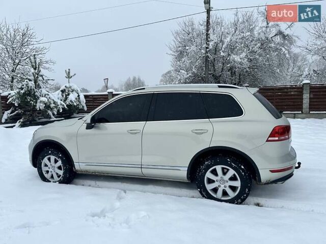 Серый Фольксваген Туарег, объемом двигателя 3 л и пробегом 190 тыс. км за 22700 $, фото 2 на Automoto.ua