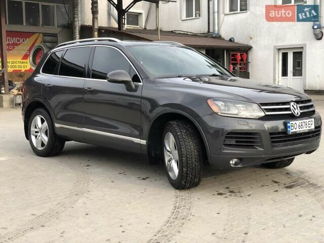 Серый Фольксваген Туарег, объемом двигателя 2.97 л и пробегом 263 тыс. км за 15900 $, фото 3 на Automoto.ua