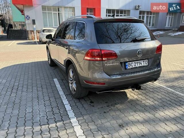 Сірий Фольксваген Туарег, об'ємом двигуна 2.97 л та пробігом 247 тис. км за 19200 $, фото 4 на Automoto.ua